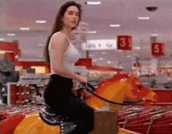 Девушка на детской качалке - картинка gif