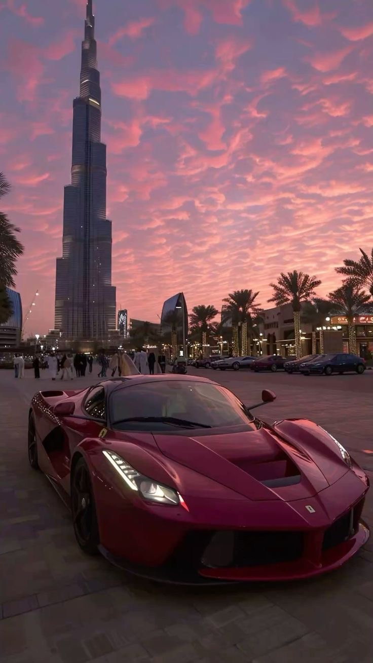 Ferrari на фоне небоскреба - гифки и картинки