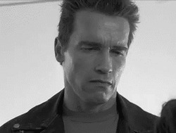 Арнольд Шварценеггер улыбается - картинка gif