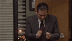 Мужчина в костюме танцует - картинка gif