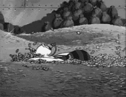 Персонаж тонет в золотых монетах - картинка gif